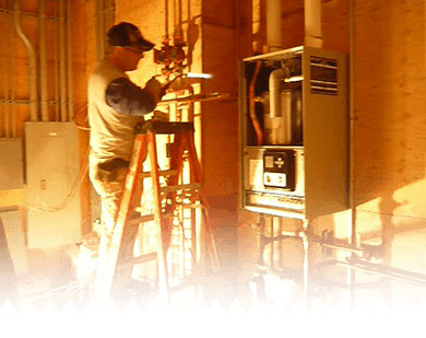 Charlie Becker installing a commercial water heater for a customer in the Flathead Valley