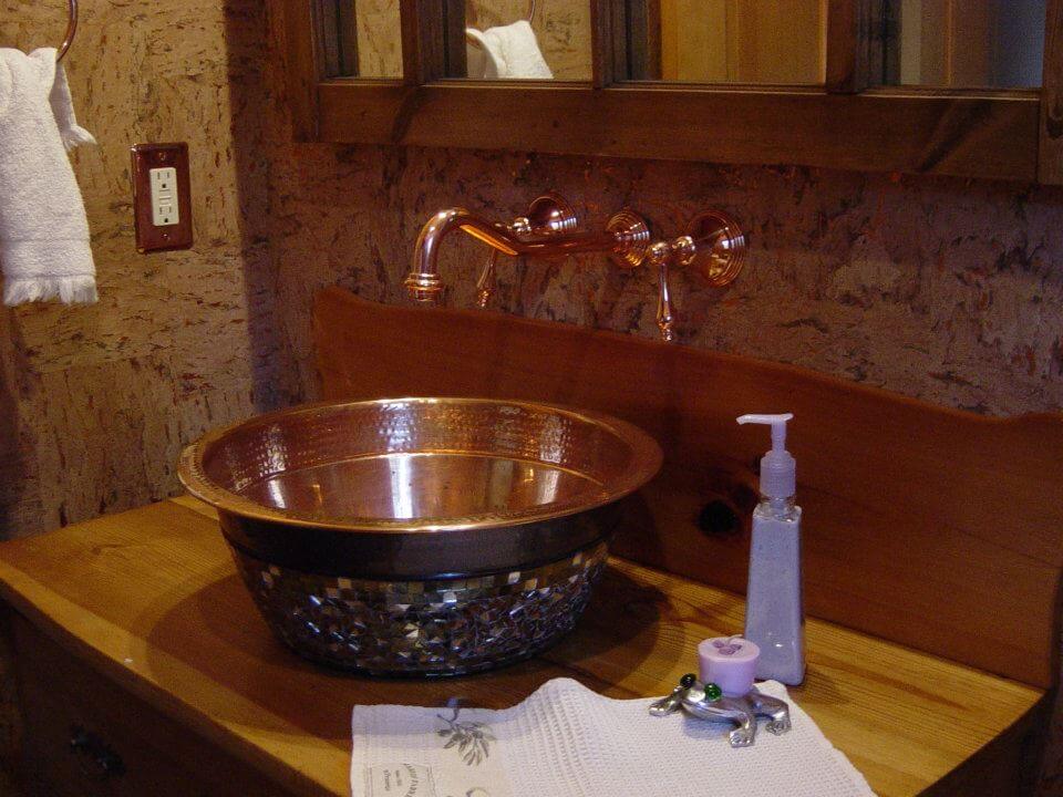 High quality copper plumbing fixtures installed during a bathroom remodel in Whitefish Montana